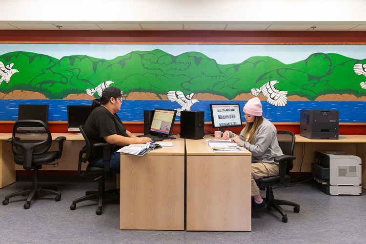 Two students working on their computers