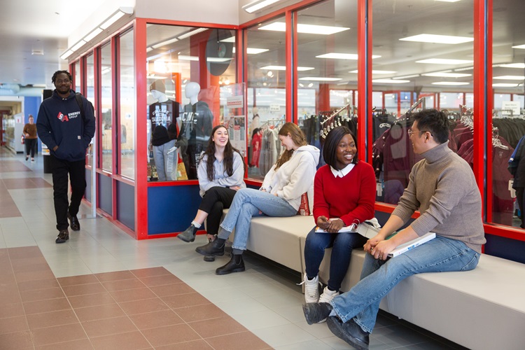 Students hanging out outside the bookstore