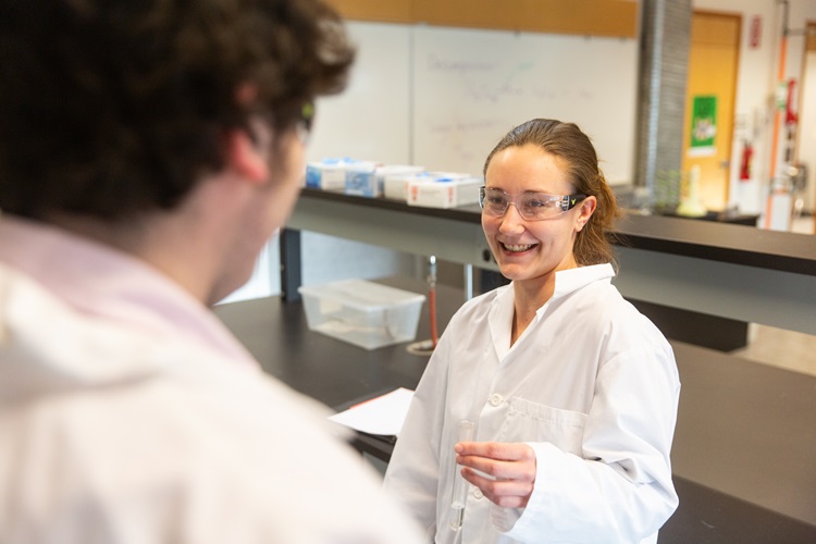 Chemistry student holding test tube