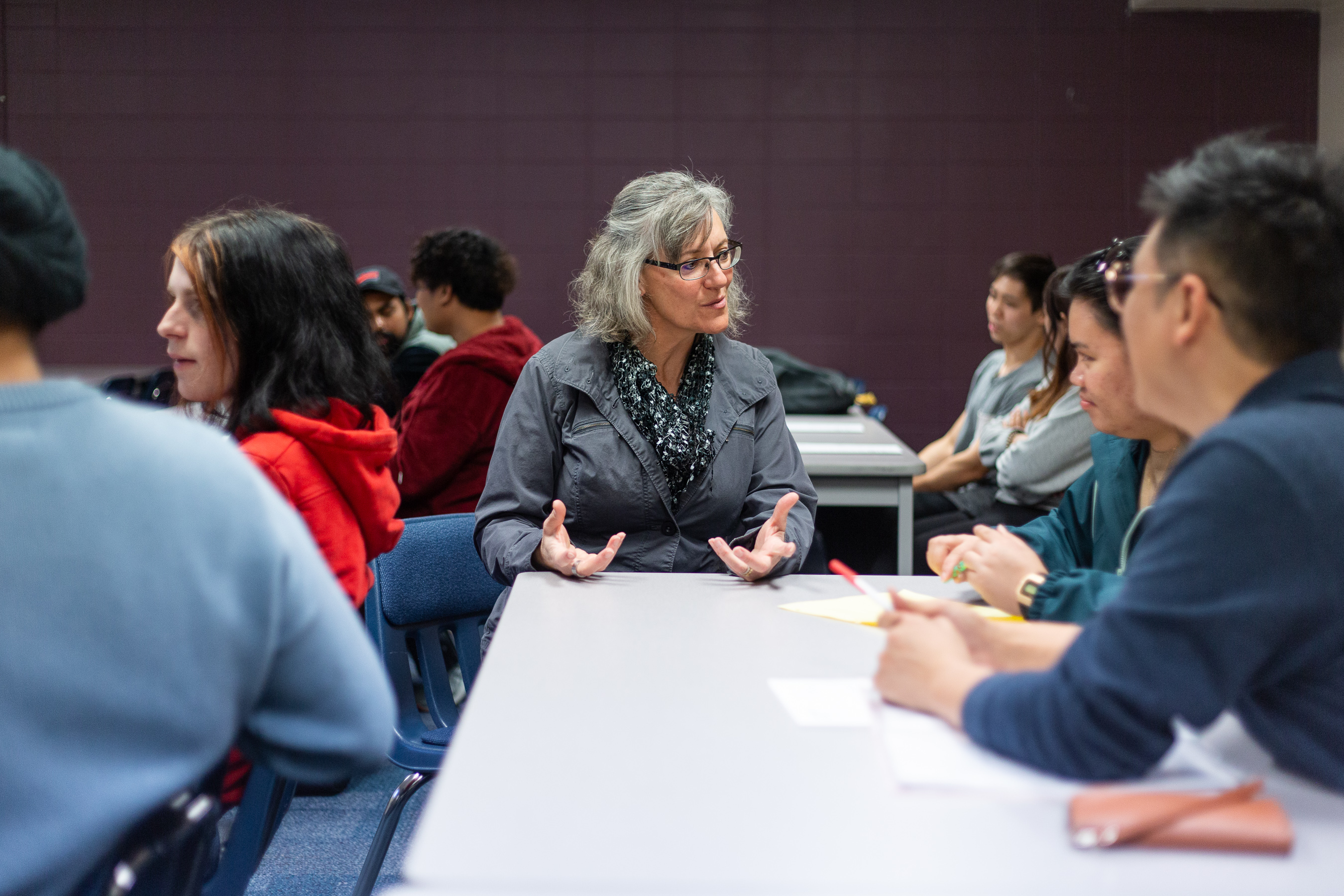 Professor working closely with students